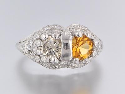 Appraisal: A Ladies' Platinum Diamond and Citrine Ring Platinum mounting in