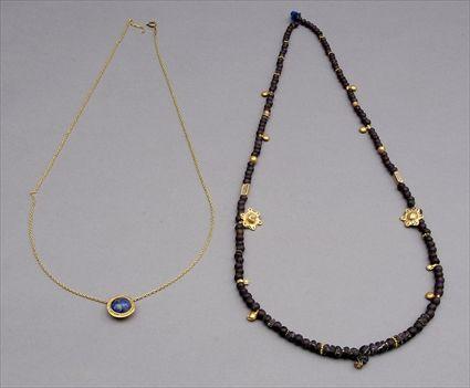 Appraisal: Persian Gold Ornament and Glass Bead Necklace together with Lapis