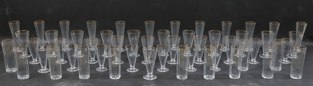 Appraisal: pieces Carlo Moretti glassware with gilt rim champagne flutes with