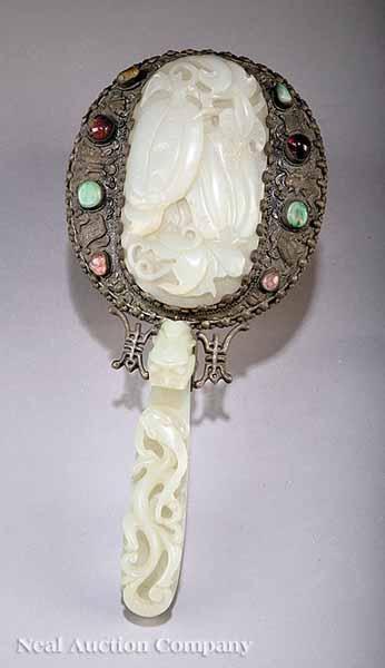 Appraisal: A Chinese Carved Soapstone and Silver-Mounted Hand Mirror th c