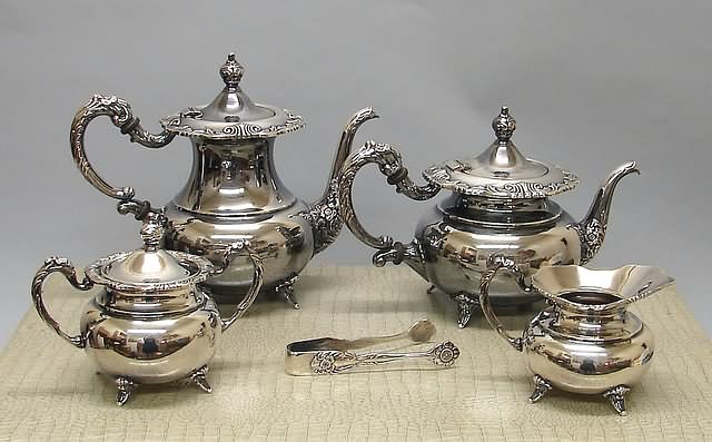 Appraisal: Service Bun form urn finials tab feet consisting of teapot