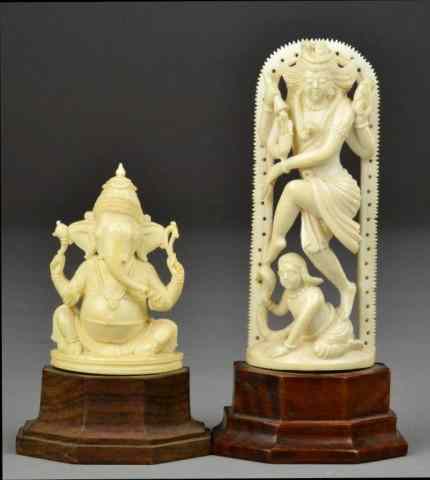 Appraisal: Carved Ivory Indian Figures on StandsNicely carved ivory figures of