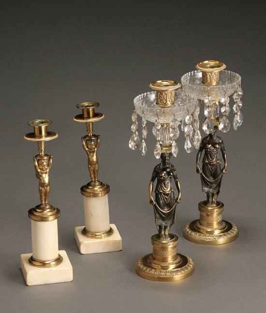 Appraisal: Two Pairs of Neoclassical Style Ormolu and Bronze Figural Candlesticks