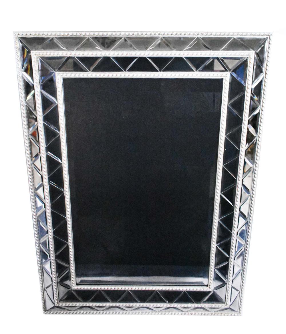 Appraisal: CONTEMP SILVERED WOOD MIRROR-FRAMED MIRRORRectangular the rope-twist borders centering numerous