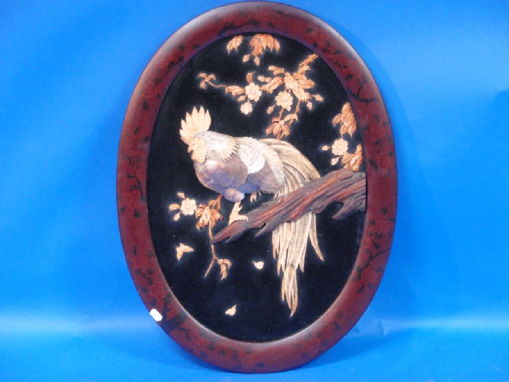 Appraisal: A Japanese lacquer wall plaque with bone mother-of-pearl and abalone