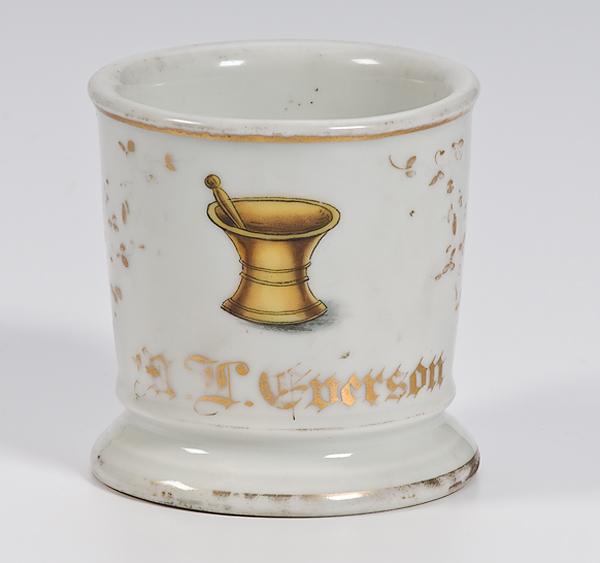 Appraisal: PHARMACIST'S OCCUPATIONAL SHAVING MUG Porcelain mug with gilding mortar and