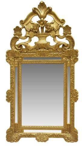 Appraisal: Italian giltwood mirror th c tall crest carved with flowers