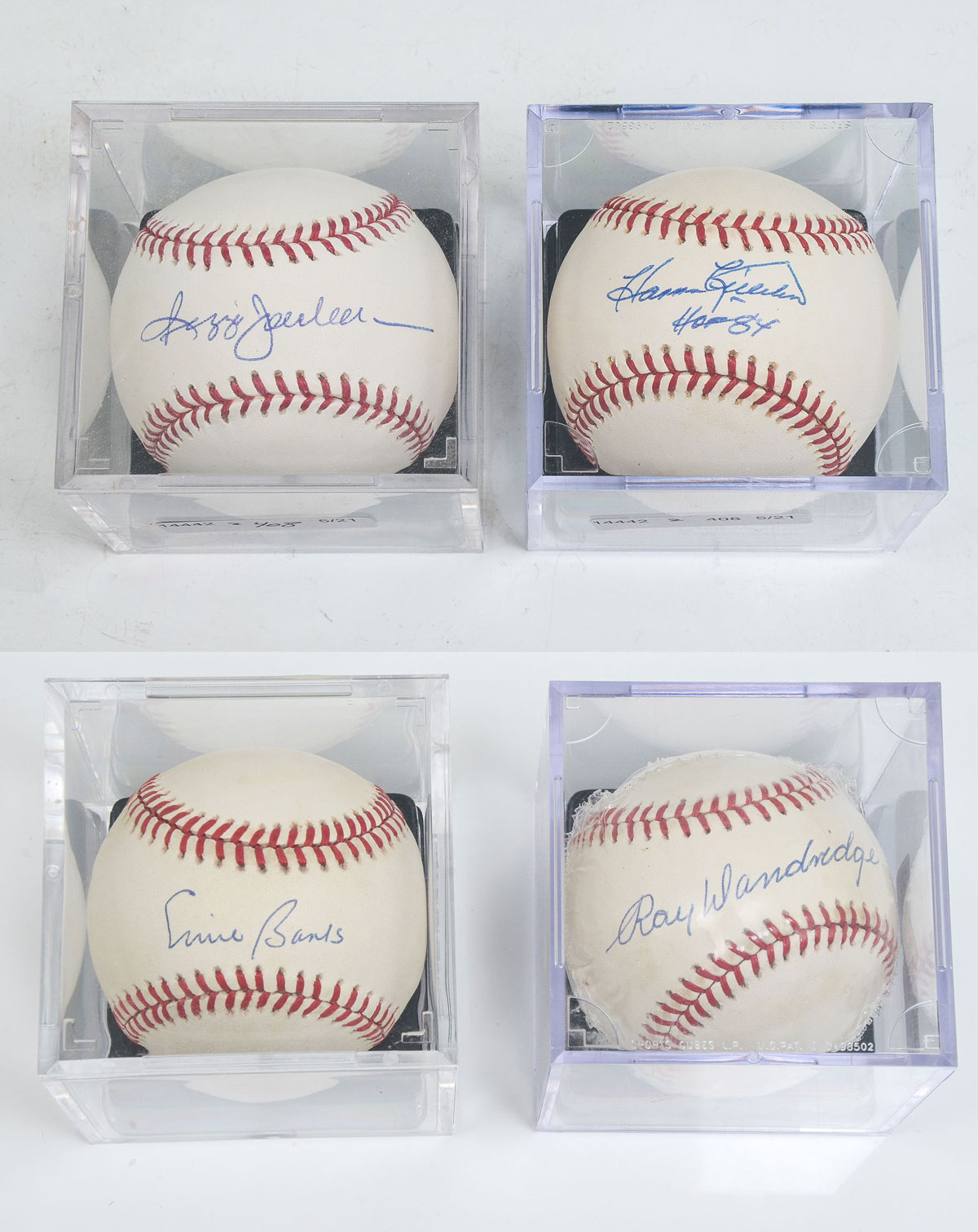 Appraisal: FOUR AUTOGRAPHED MLB BASEBALLS INCLUDING REGGIE JACKSON Four autographed baseballs