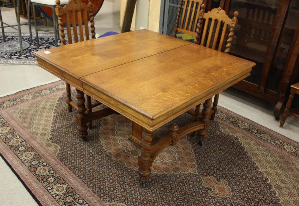 Appraisal: SQUARE OAK DINING TABLE WITH SIX LEAVES American c the