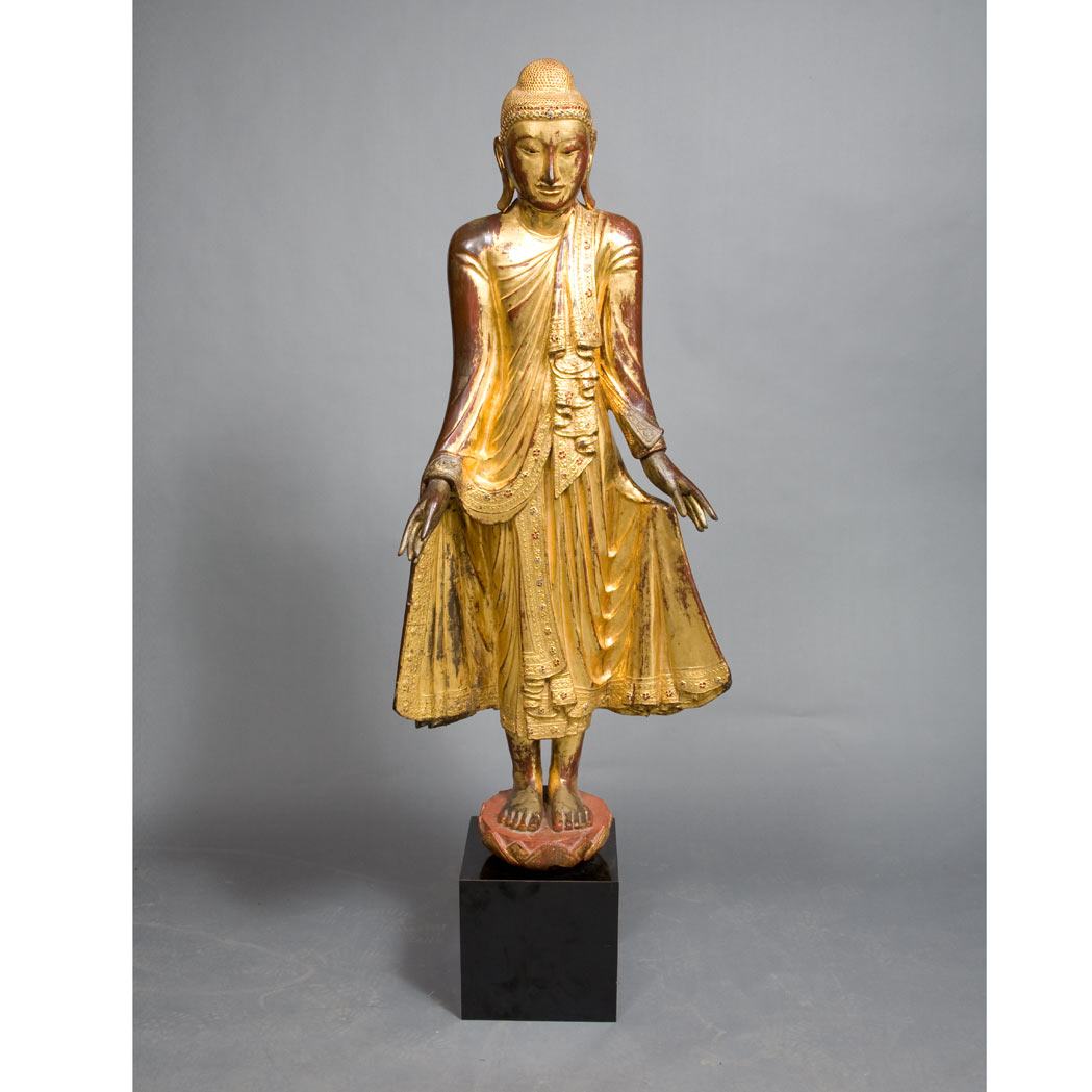 Appraisal: Thai Gilt and Lacquered Wood Standing Buddha th Century Dressed