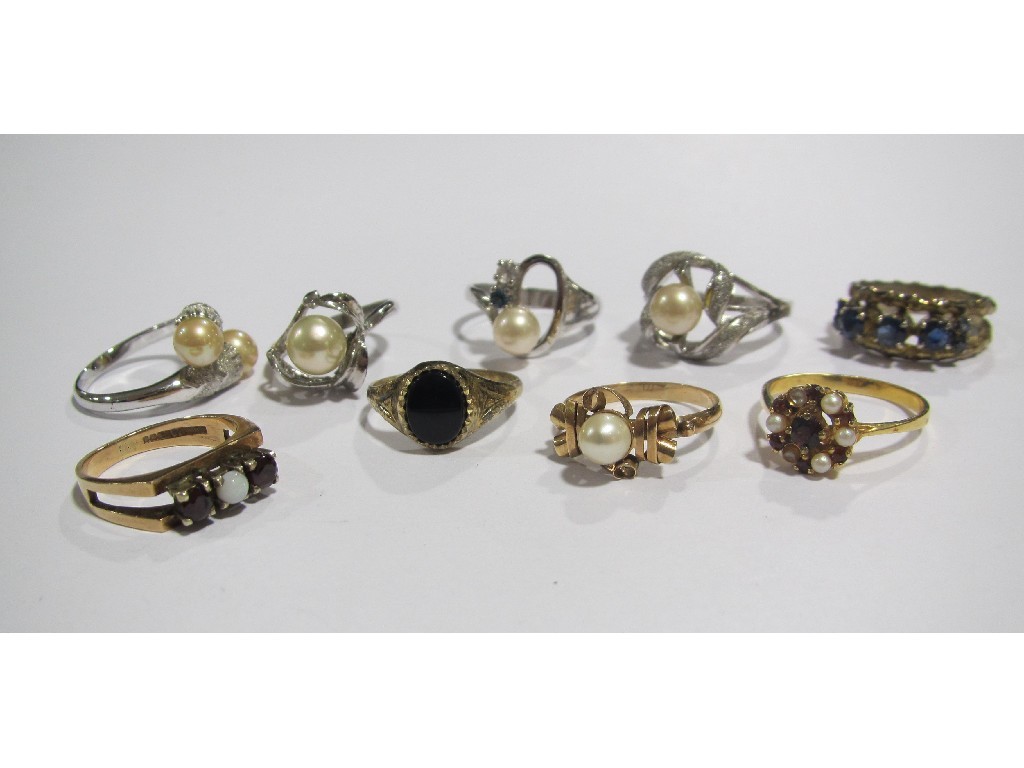 Appraisal: Lot comprising four ct gold gem set dress rings and