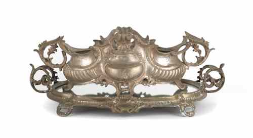 Appraisal: Large bronze centerpiece th c with a matching mirrored plateau