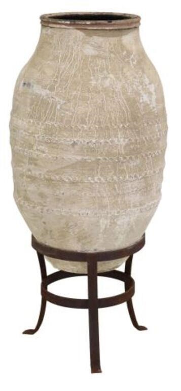 Appraisal: Large terracotta olive jar in a white finish early th