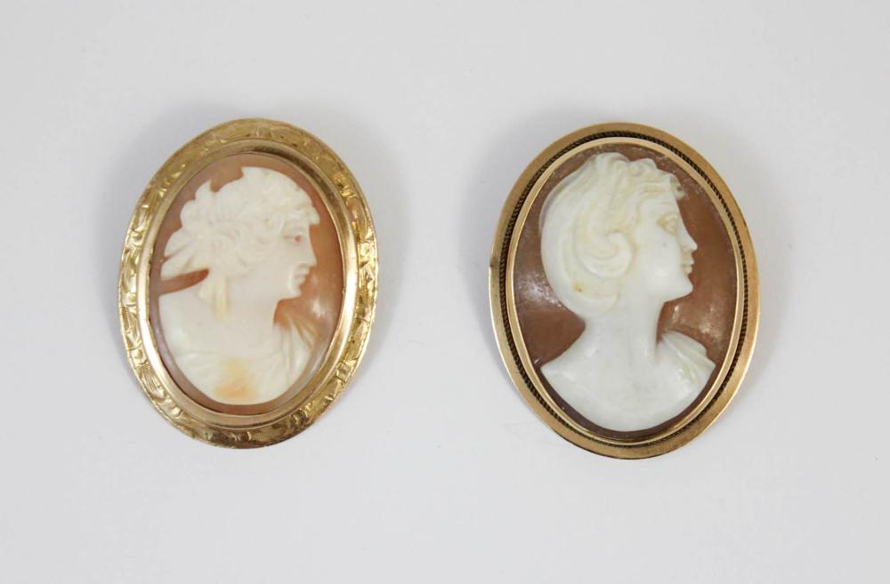 Appraisal: TWO VICTORIAN CAMEO PENDANT BROOCHES including a k yellow gold