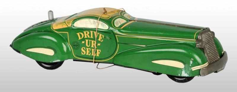 Appraisal: Tin Marx Drive-Ur-Self Automobile Wind-Up Toy Description American Working Scarce