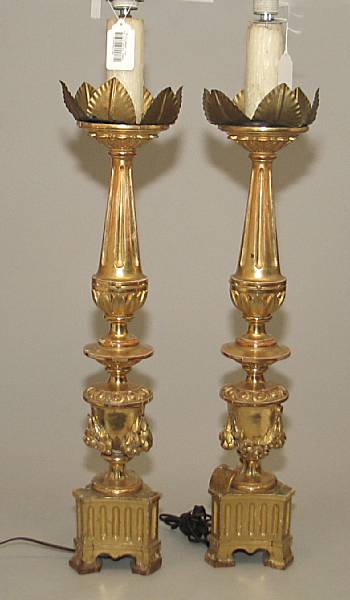 Appraisal: A pair of Italian giltwood candle prickets th century Each