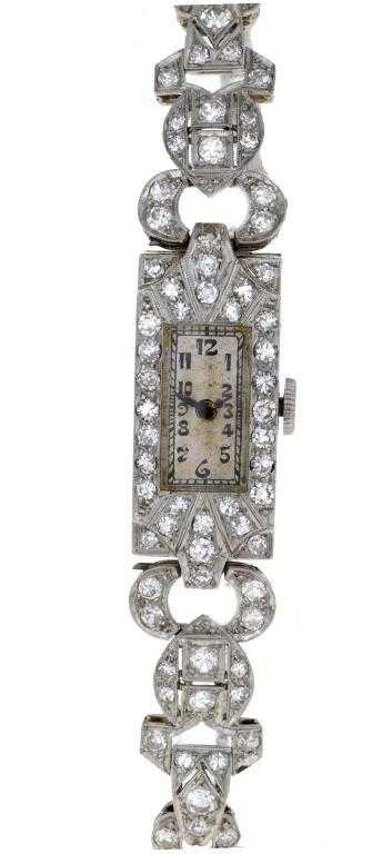 Appraisal: A DIAMOND COCKTAIL WATCH with rectangular dial and case with