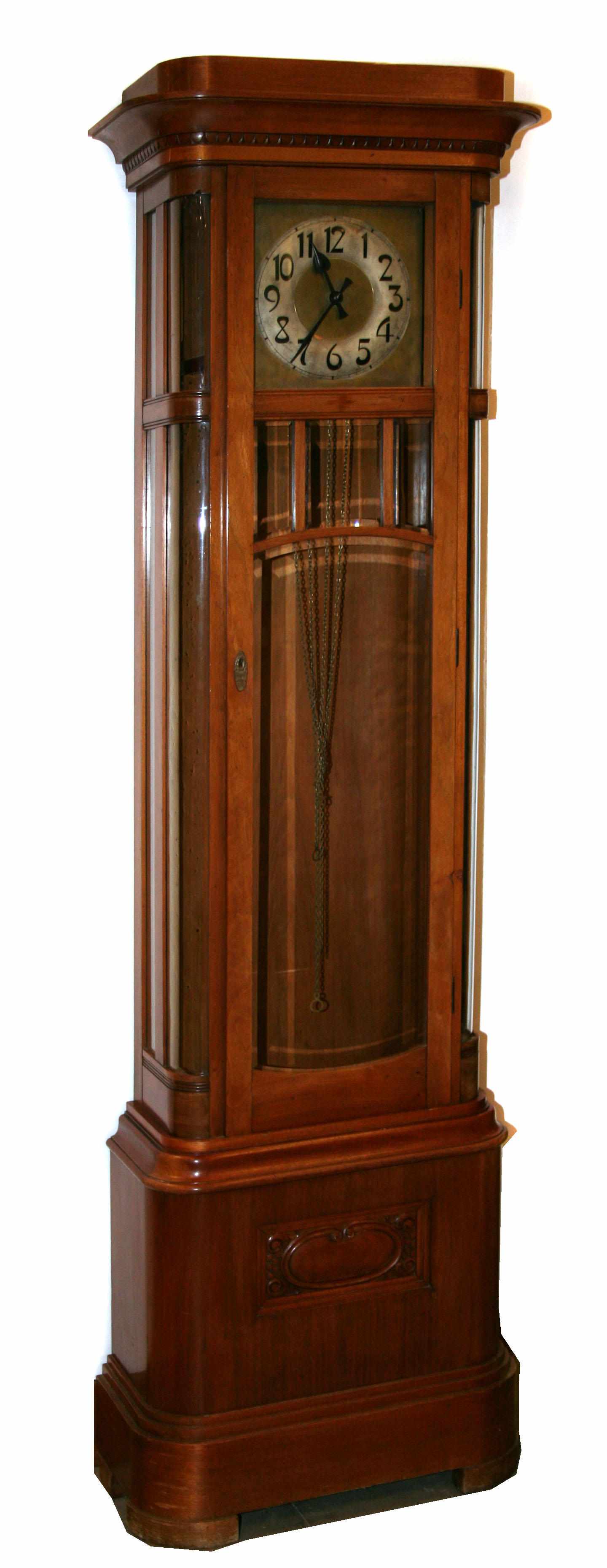 Appraisal: A Continental transitional Art Deco fruitwood tall case clock circa