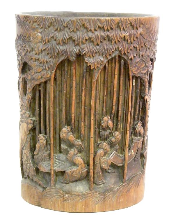 Appraisal: Chinese brush pot carved in relief with figures amidst woodland