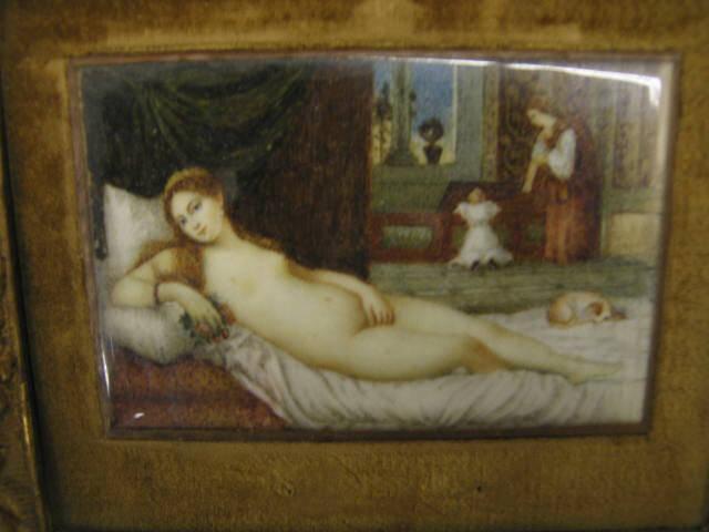 Appraisal: Miniature Painting on Ivory of a Nude reclining dog at