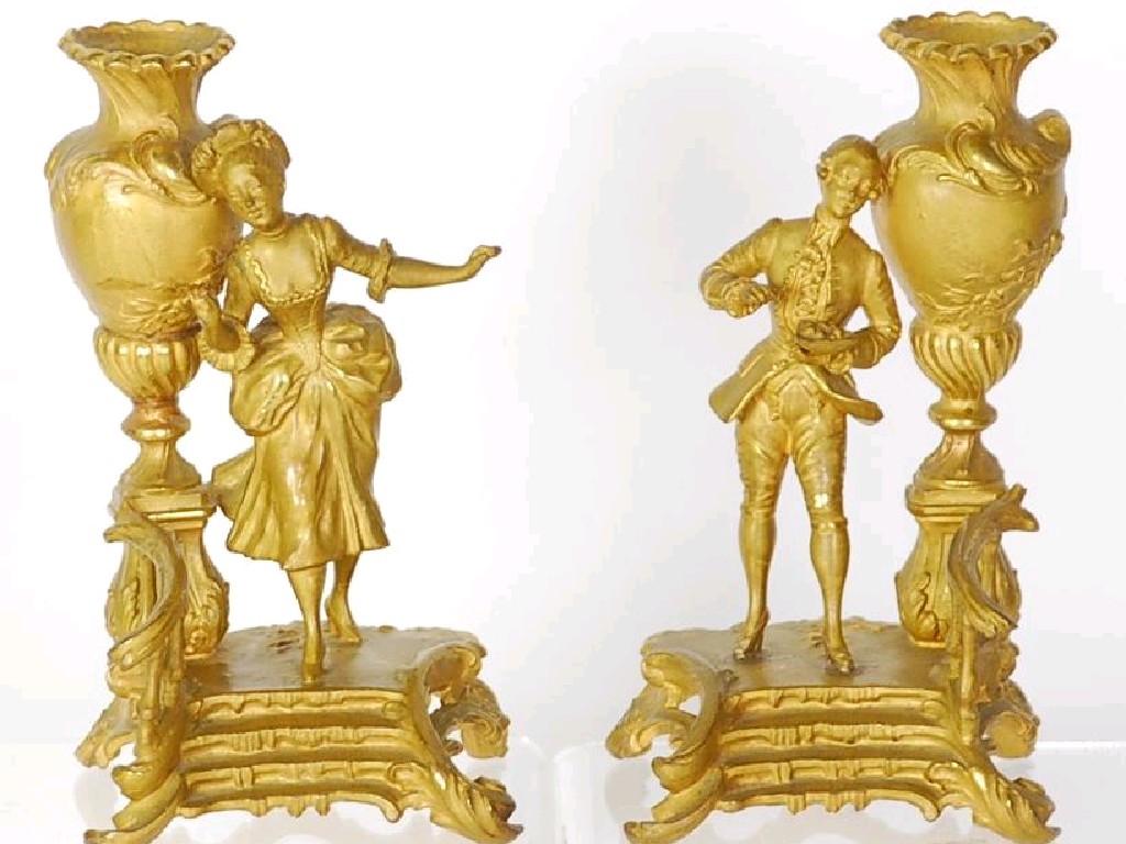 Appraisal: PAIR OF ROCOCO STYLE ORMOLU FIGURAL TAPER HOLDERS cast as