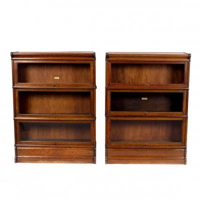 Appraisal: A pair of Globe Wernicke type three-section oak bookcases each