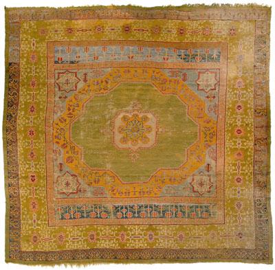 Appraisal: Oushak rug central medallion with star corner work colorful palette