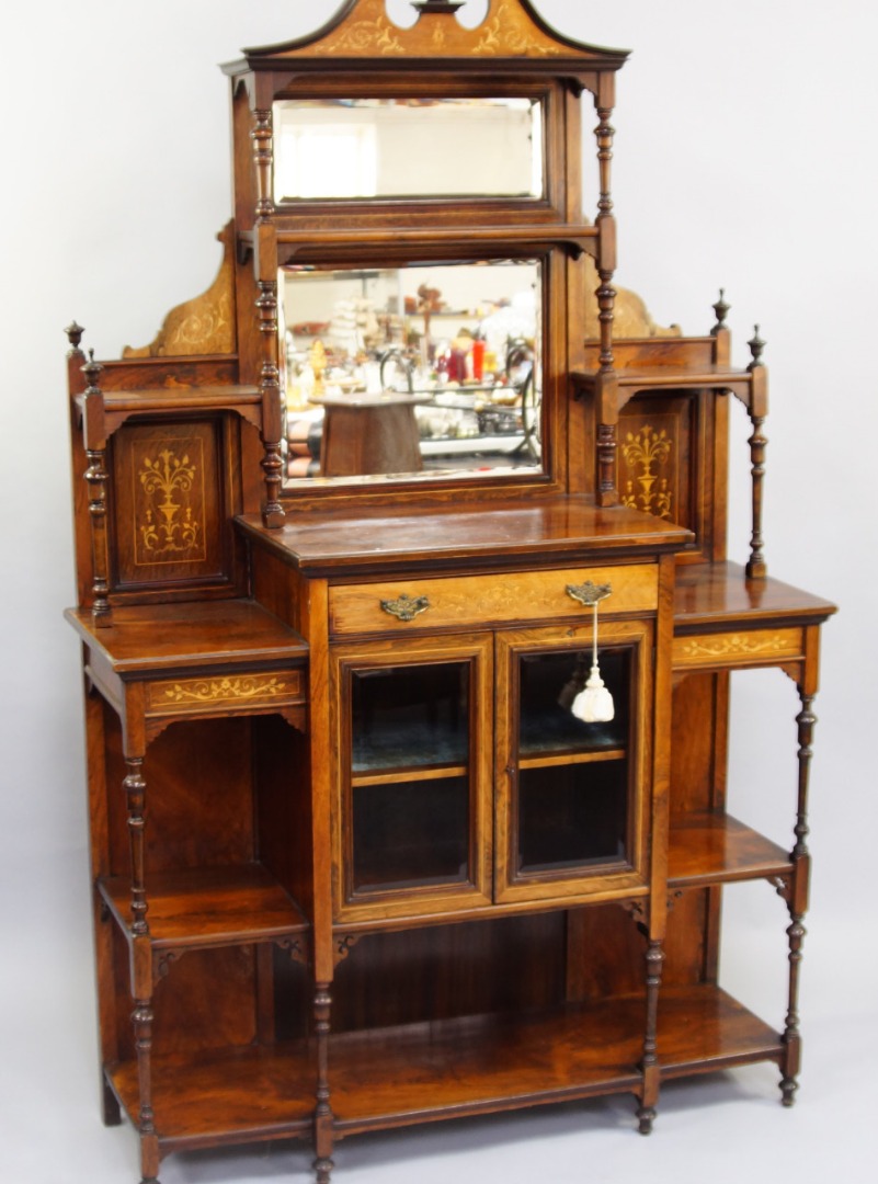 Appraisal: A Victorian rosewood and inlaid display cabinet the broken arch