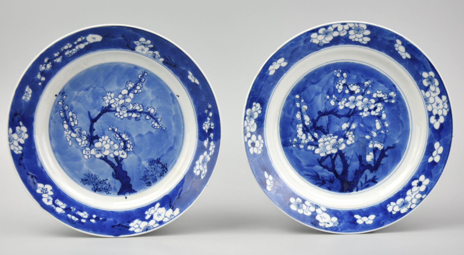 Appraisal: TWO CHINESE BLUE WHITE PLATE W PLUM KANGXI P two