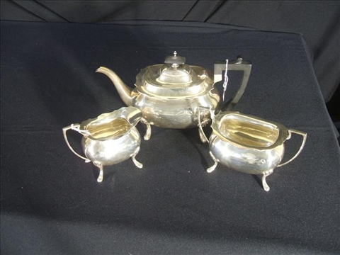 Appraisal: ENGLISH SILVER THREE PIECE TEA SET Walker Hall Sheffield -