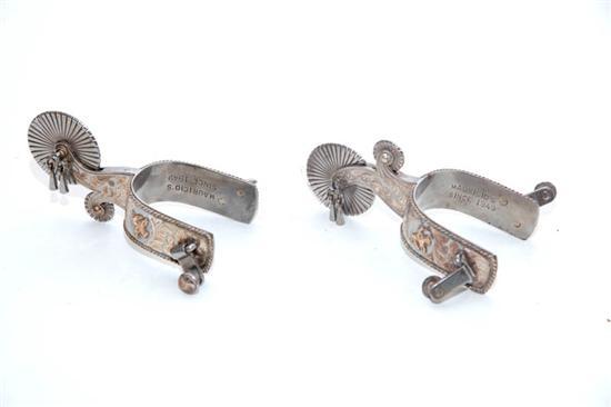 Appraisal: PAIR OF ENGRAVED SPURS American th century Double rowels with