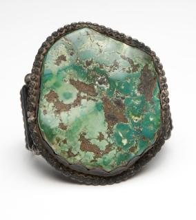 Appraisal: A Native American turquoise and silver cuff The oversized turquoise