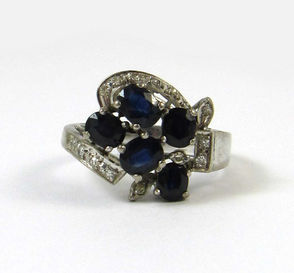 Appraisal: SAPPHIRE DIAMOND AND EIGHTEEN KARAT GOLD RING The k white