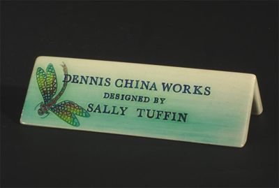 Appraisal: Dennis Chinaworks' an advertising plaque decorated with a dragonfly cm