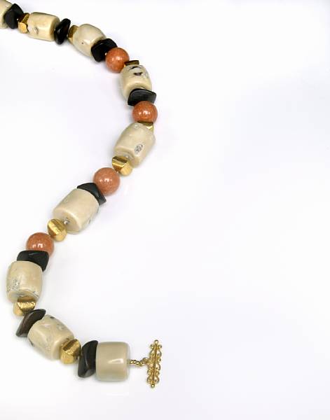 Appraisal: Branch Coral Orange Calcite and Ebony Wood Necklace An impressive