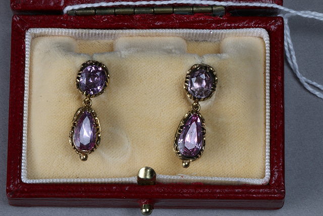 Appraisal: A PAIR OF TH CENTURY PINK TOPAZ DROP EARRINGS pear