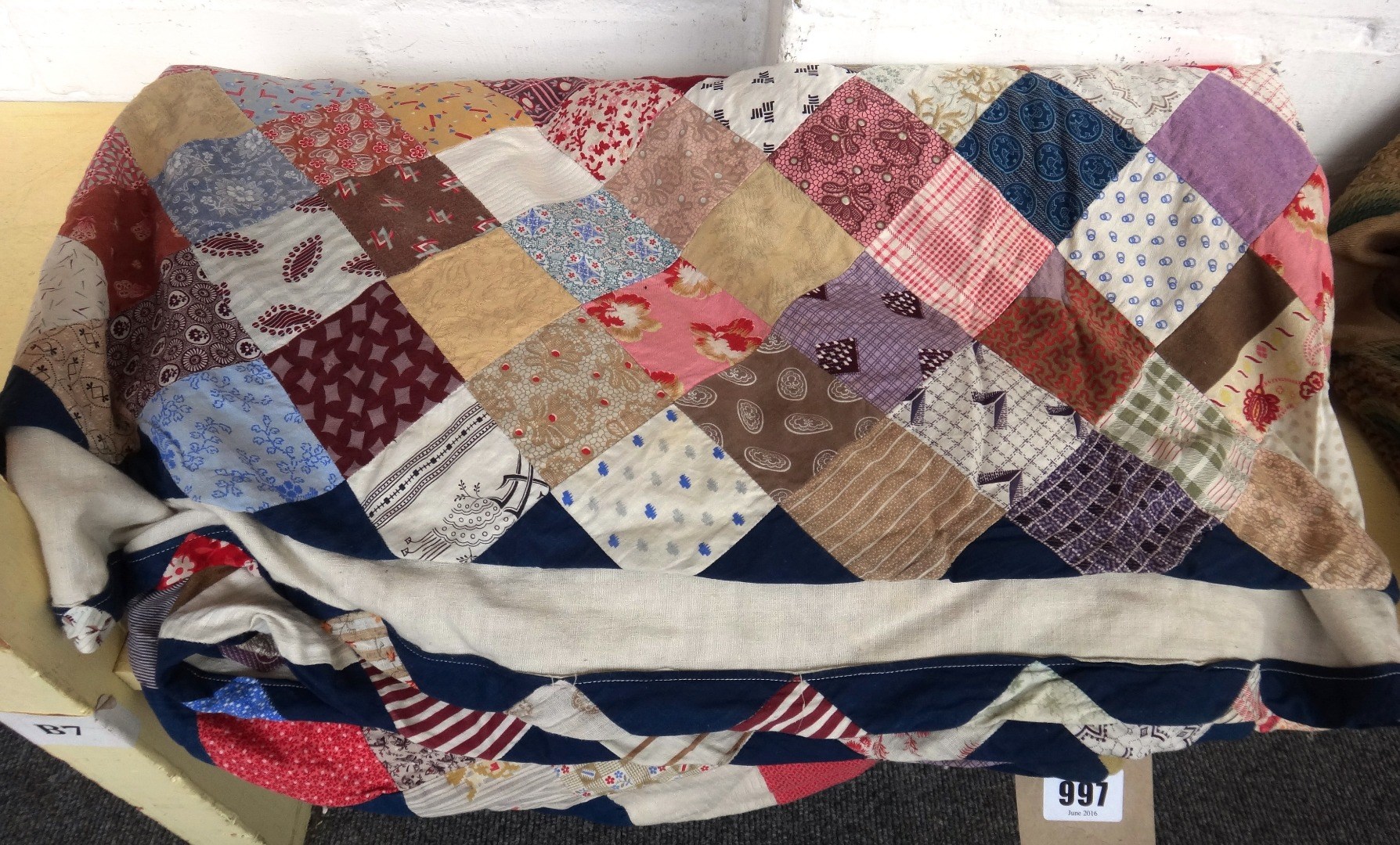 Appraisal: A patchwork quilt early th century centred with a Union