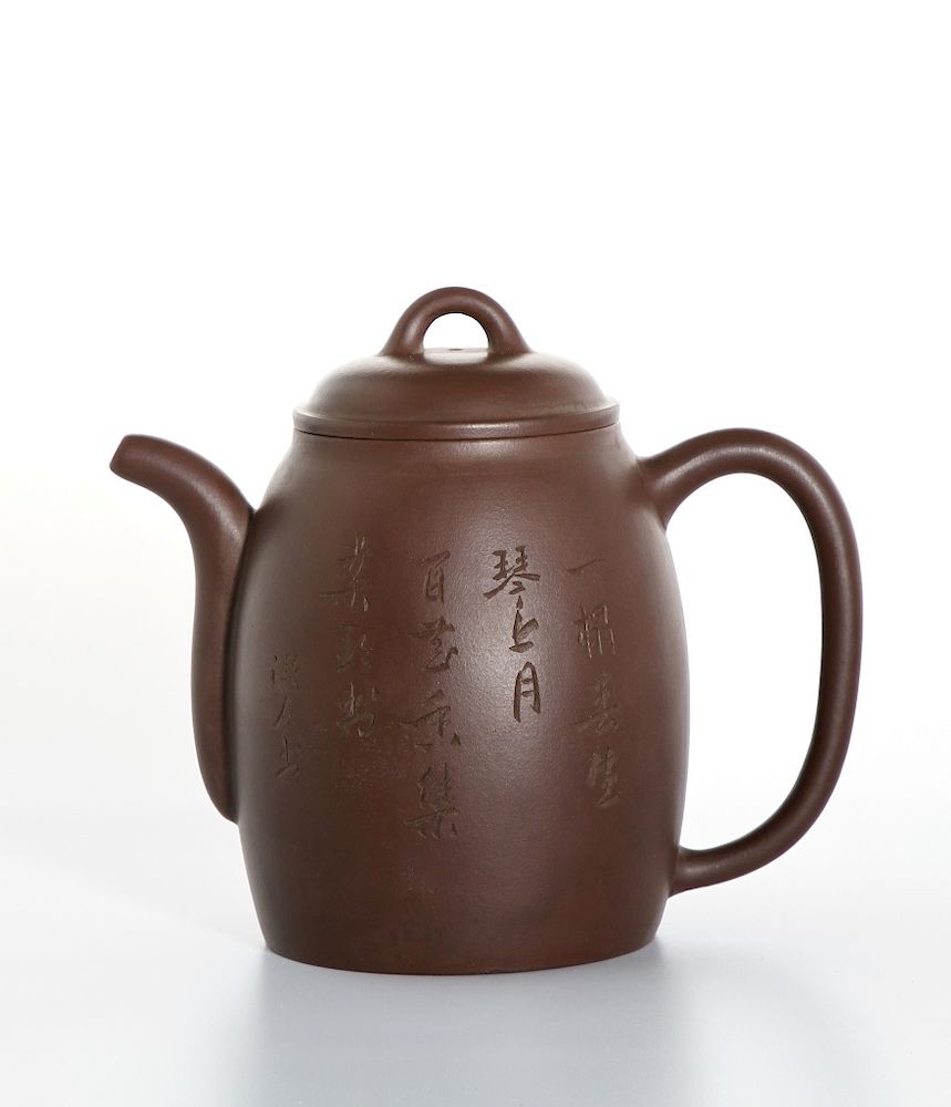 Appraisal: Chinese Yixing Inscribed Teapot and Cover Of oval section with