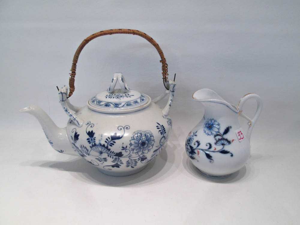 Appraisal: MEISSEN STYLE PORCELAIN TEA POT AND CREAMER in a Blue