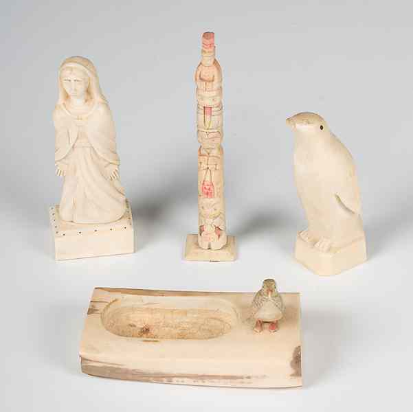 Appraisal: Alaskan Carved Walrus Ivory Figures lot of includes a small