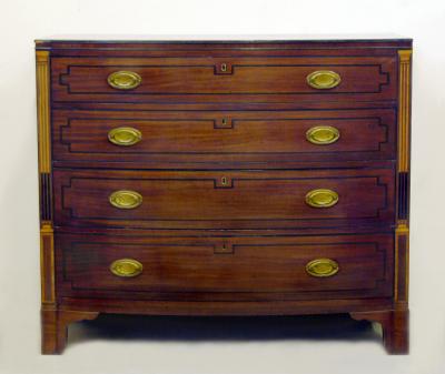 Appraisal: A GEORGE III MAHOGANY CHEST of bowed form with ebony