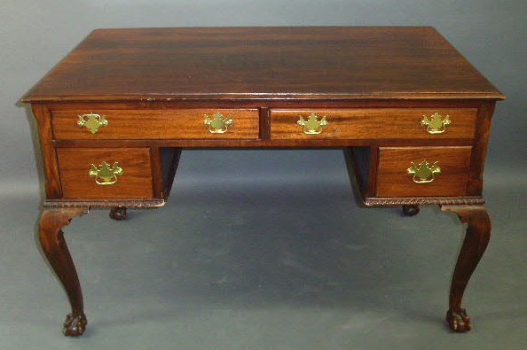 Appraisal: Chippendale style mahogany partner s desk with ball and claw