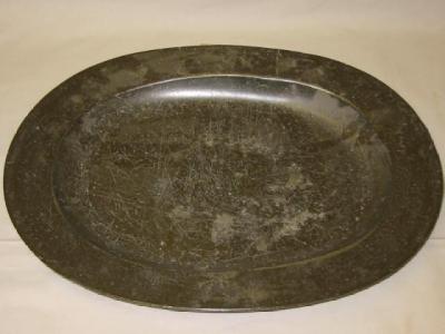 Appraisal: A GEORGIAN PEWTER MEAT DISH of oval plain rimmed form