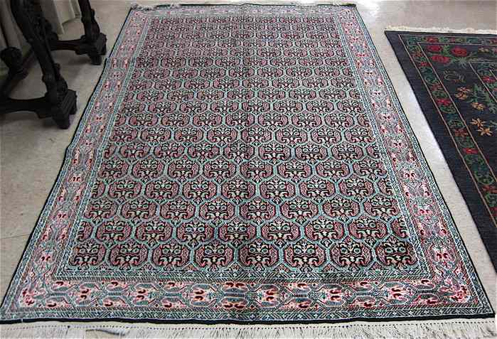 Appraisal: HAND KNOTTED ORIENTAL CARPET Kashmiri Indo-Persian silk-like mercerized cotton pile