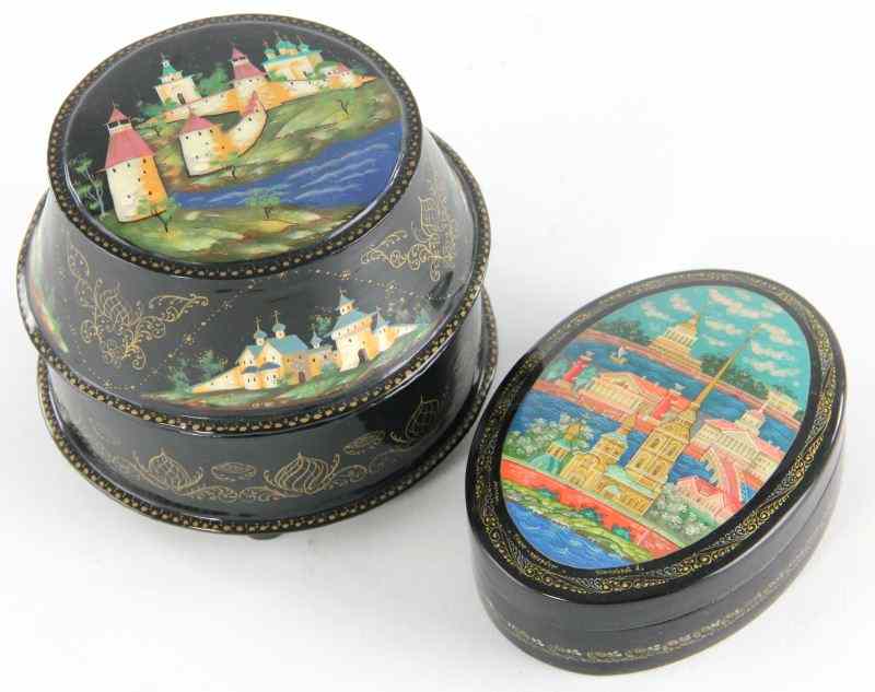 Appraisal: Two Russian Lacquered Boxeseach hand-painted with architectural scenes to the