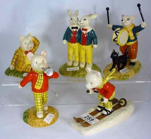 Appraisal: Royal Doulton Rupert the Bear Figures Banging on his Drum