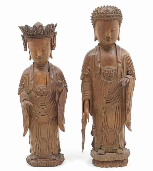 Appraisal: A Chinese wood carving of Buddhist deities height in diameter