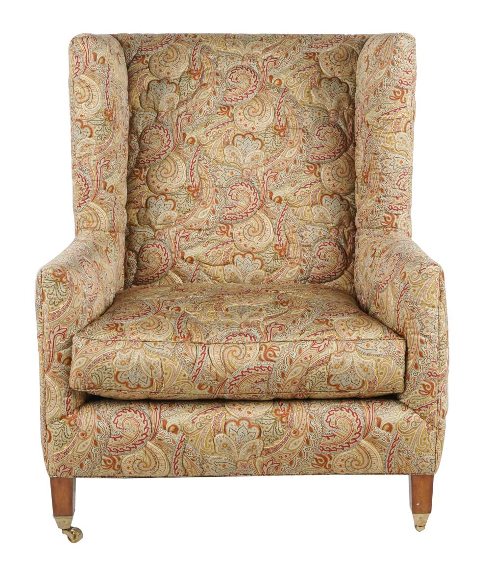 Appraisal: UPHOLSTERED WING CHAIRno label covered with quilted paisley fabric the