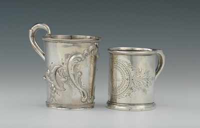 Appraisal: Two Victorian Silver Mugs The first an American coin silver