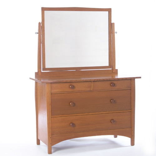 Appraisal: GUSTAV STICKLEY Chest of drawers with a two-over-two configuration pivoting